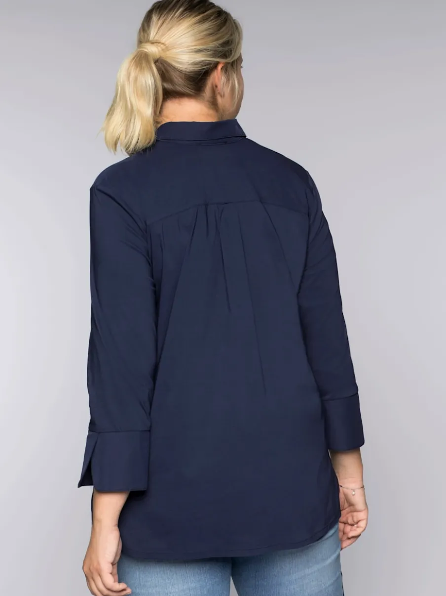 Tunique patte de boutonnage invisible