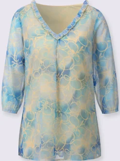 Tuniques à encolure en V avec motifs fleuris et volants
