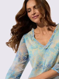 Tuniques à encolure en V avec motifs fleuris et volants