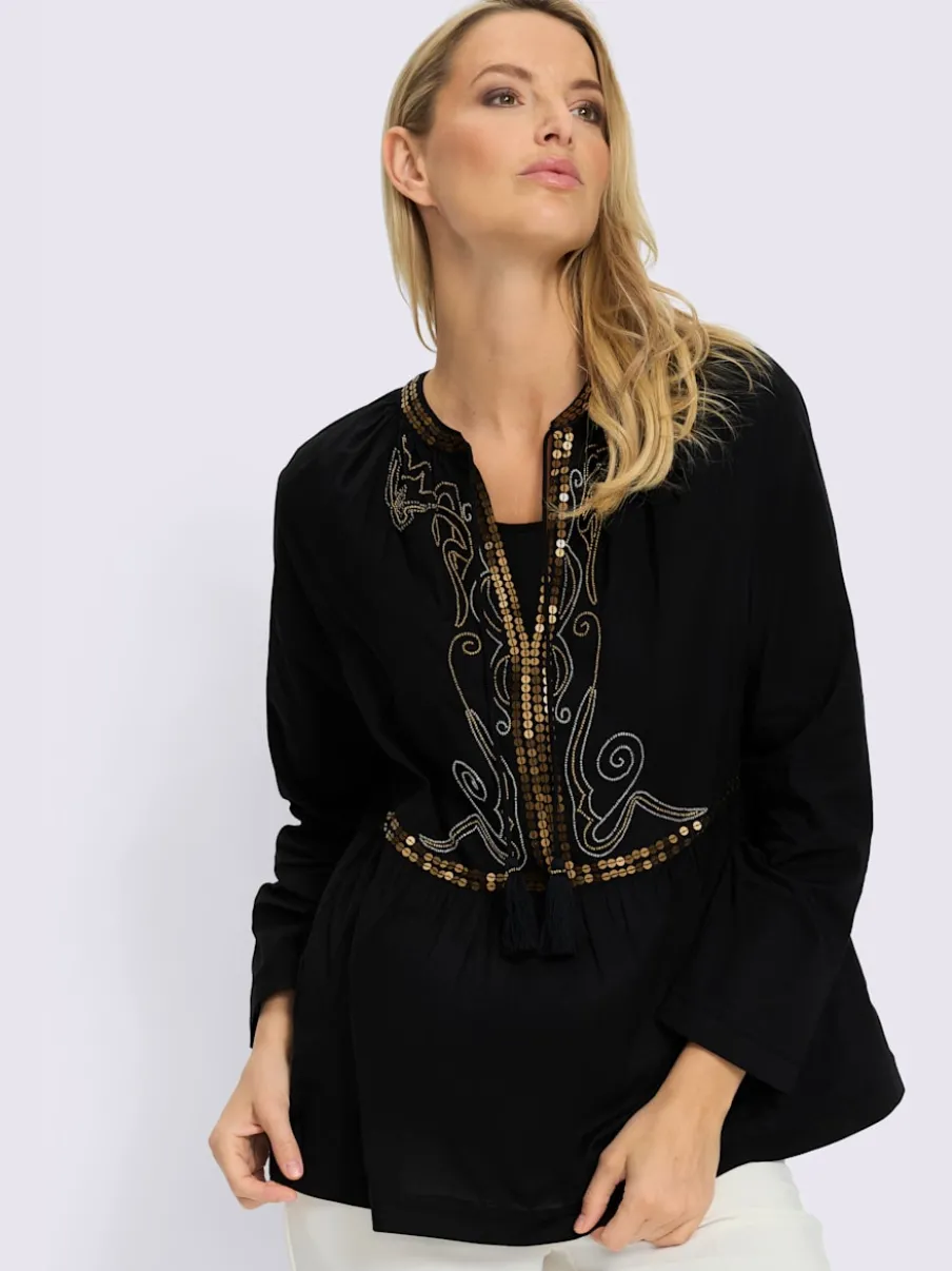 Tunique évasée avec col en V et détails en perles et paillettes