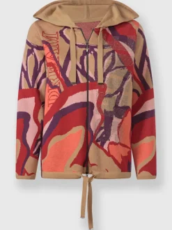 Veste à capuche en tricot avec inscription et pierres.