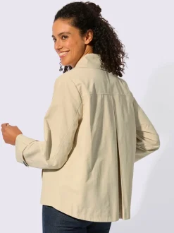 Veste courte à col à revers et manches longues avec poches raglan
