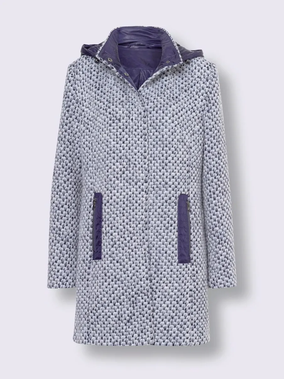 Veste d'extérieur avec capuche amovible et poches.