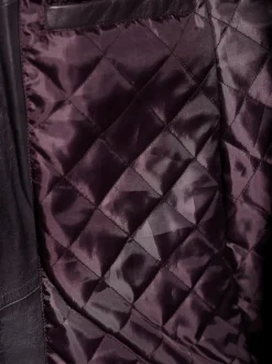 Veste en cuir d'agneau avec col convertible et empiècements affinants