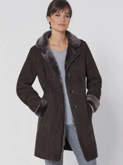 Veste en peau d'agneau col montant fourrure intérieure