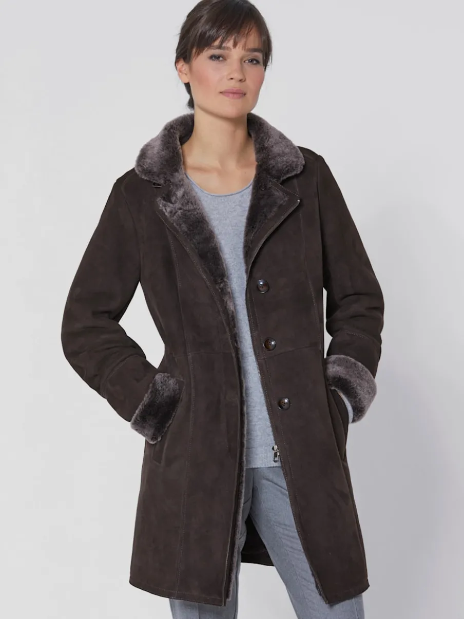 Veste en peau d'agneau col montant fourrure intérieure