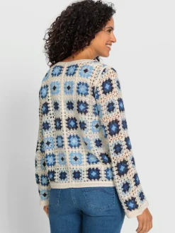 Veste en tricot aspect crochet avec col en V