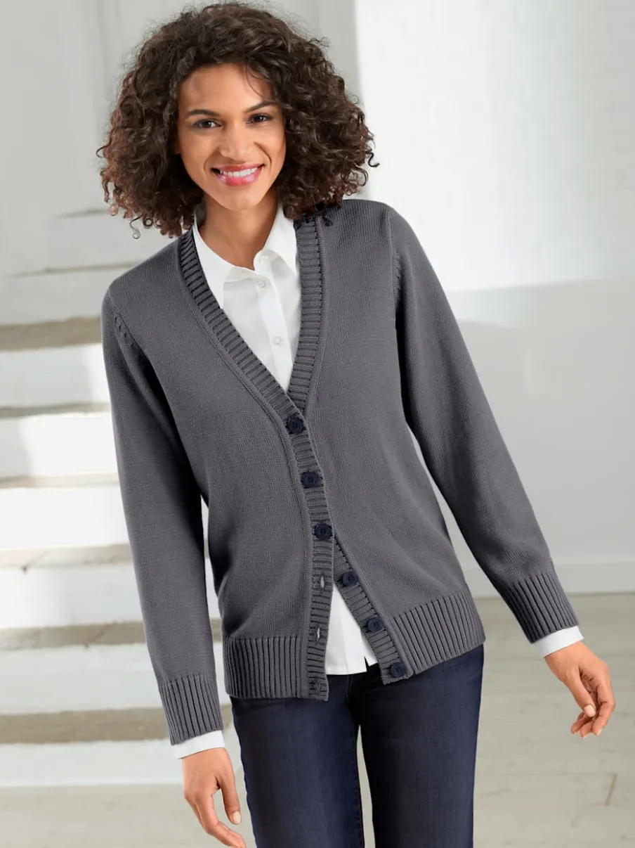 Veste en tricot avec boutons et manches longues confortables