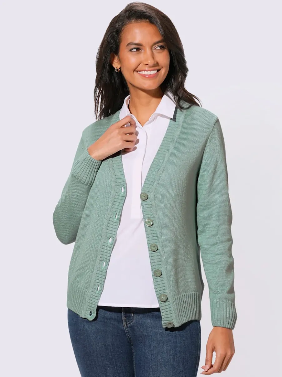 Veste en tricot avec boutons et manches longues confortables