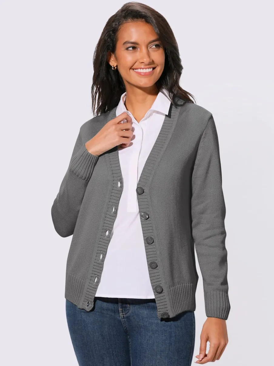 Veste en tricot avec boutons et manches longues confortables
