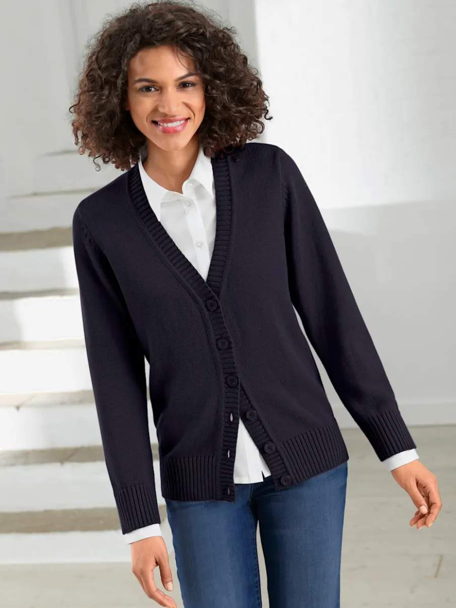 Veste en tricot avec boutons et manches longues confortables