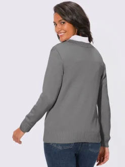 Veste en tricot avec boutons et manches longues confortables