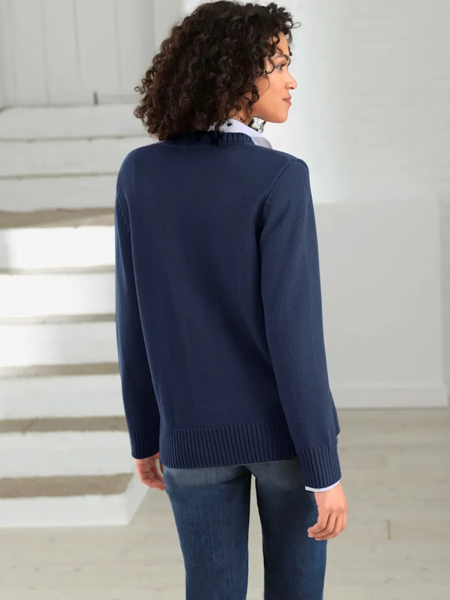 Veste en tricot avec boutons et manches longues confortables