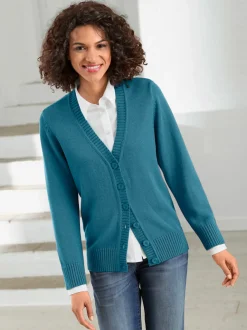 Veste en tricot avec boutons et manches longues confortables