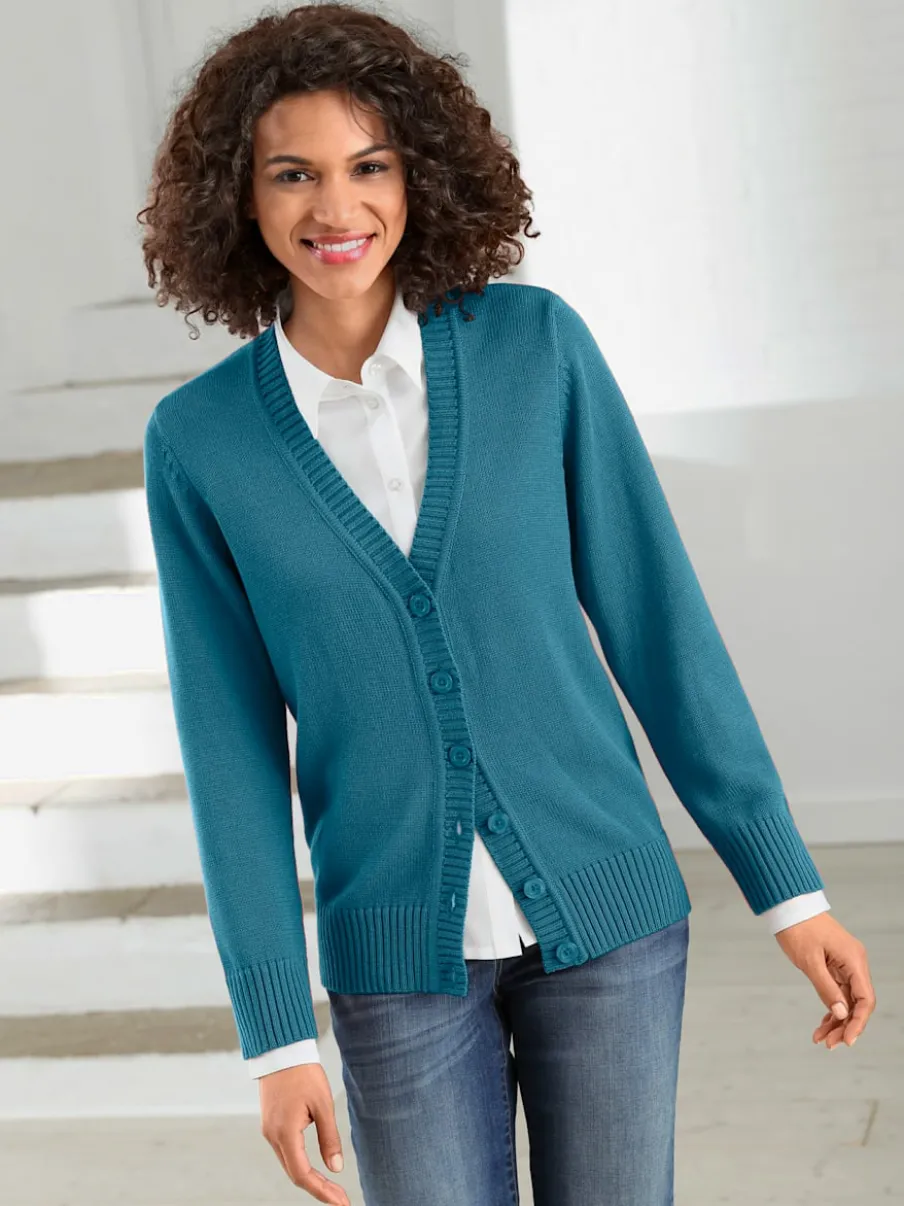 Veste en tricot avec boutons et manches longues confortables
