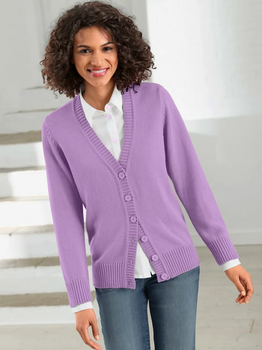 Veste en tricot avec boutons et manches longues confortables