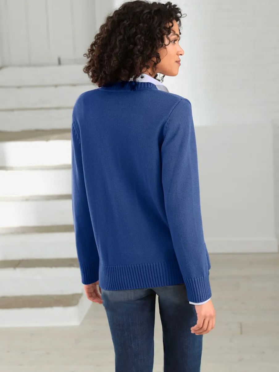 Veste en tricot avec boutons et manches longues confortables