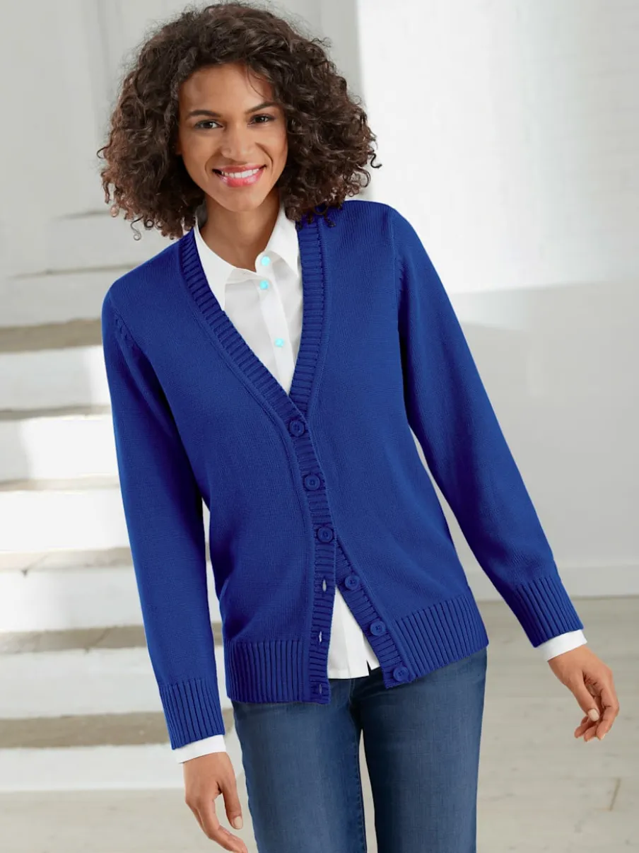 Veste en tricot avec boutons et manches longues confortables
