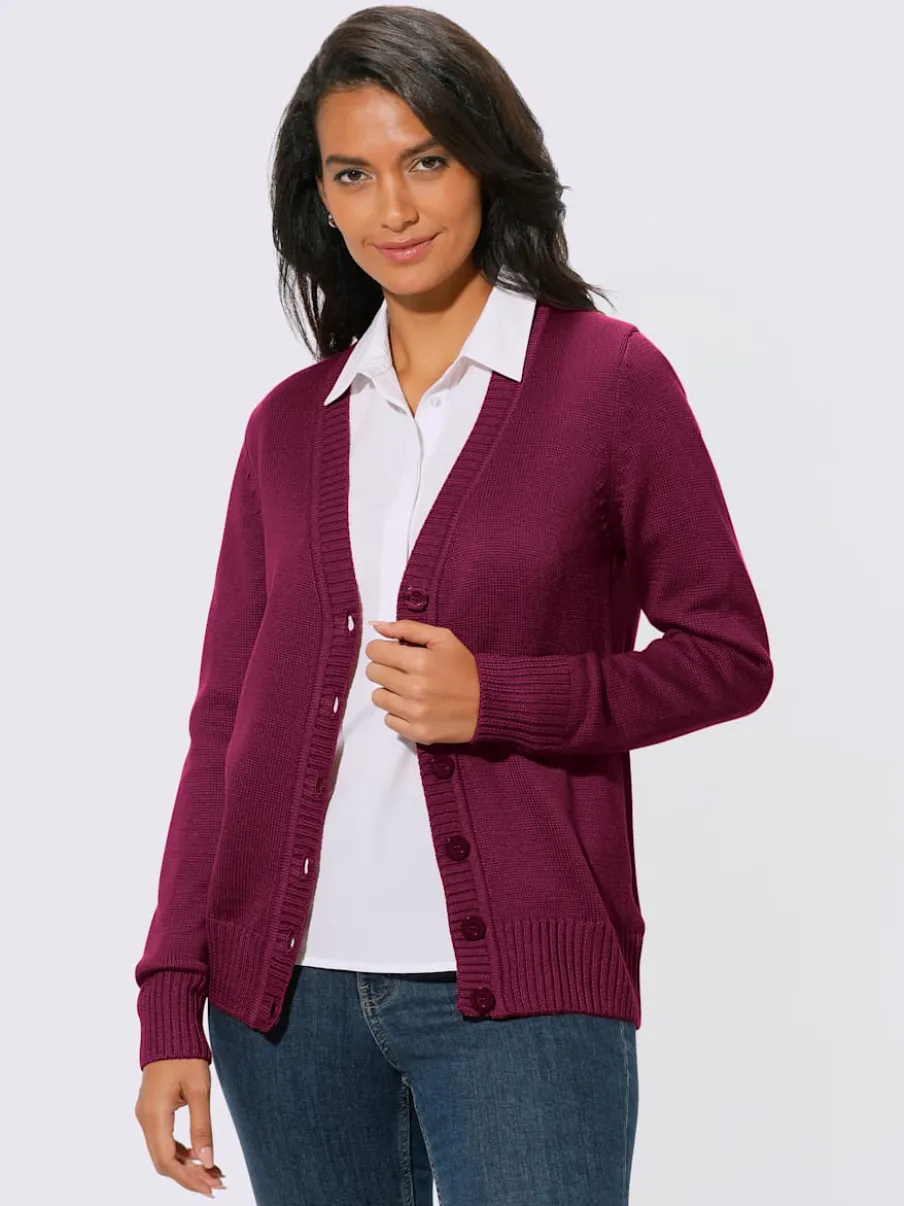 Veste en tricot avec boutons et manches longues confortables