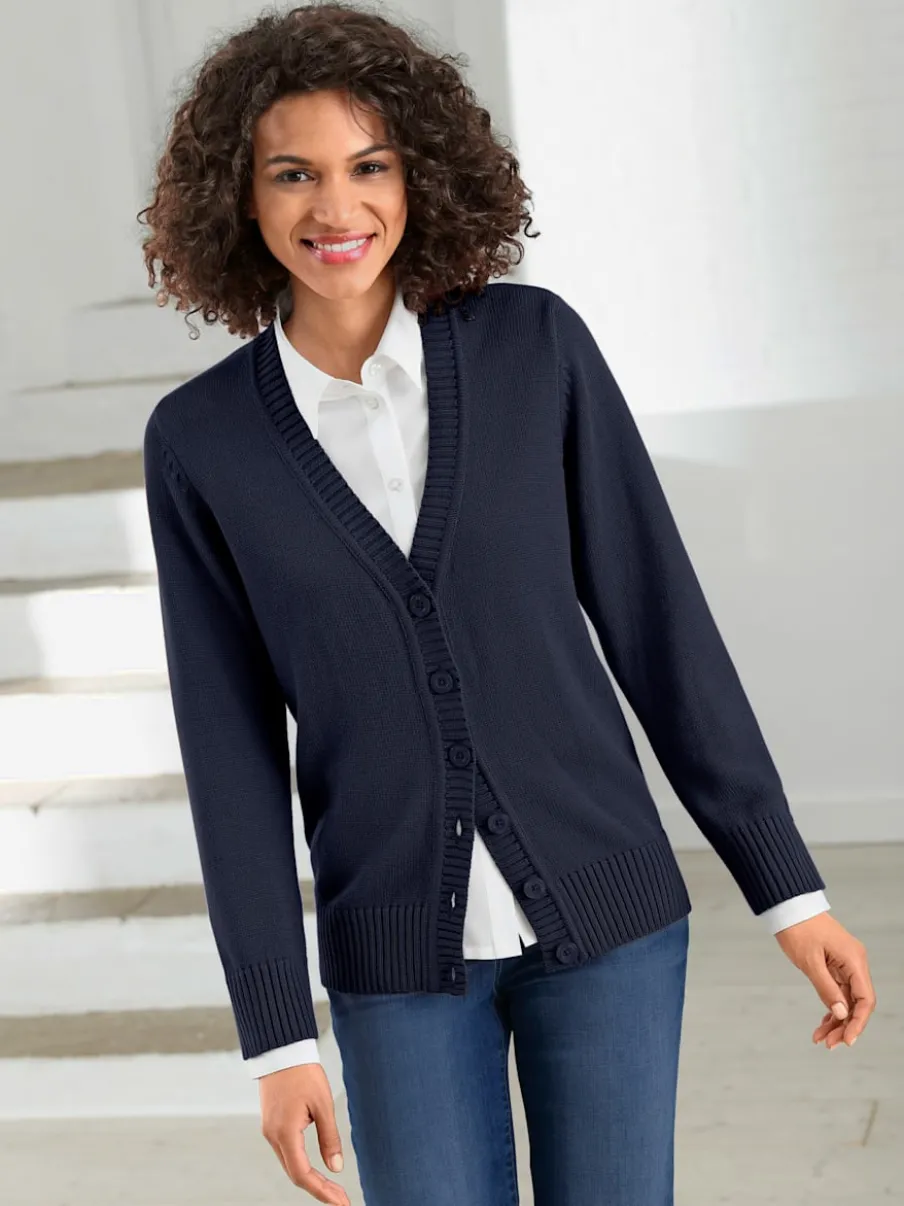 Veste en tricot avec boutons et manches longues confortables