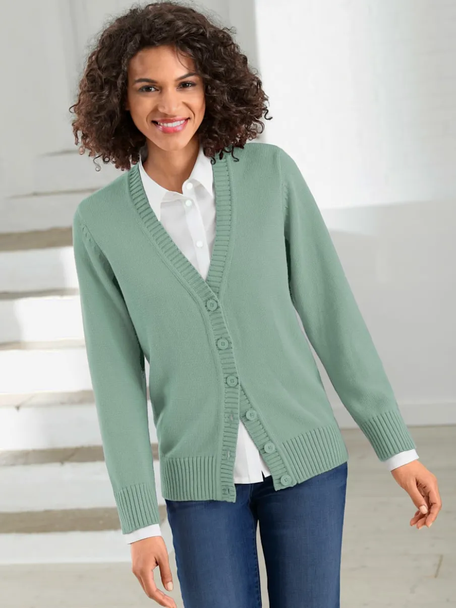 Veste en tricot avec boutons et manches longues confortables