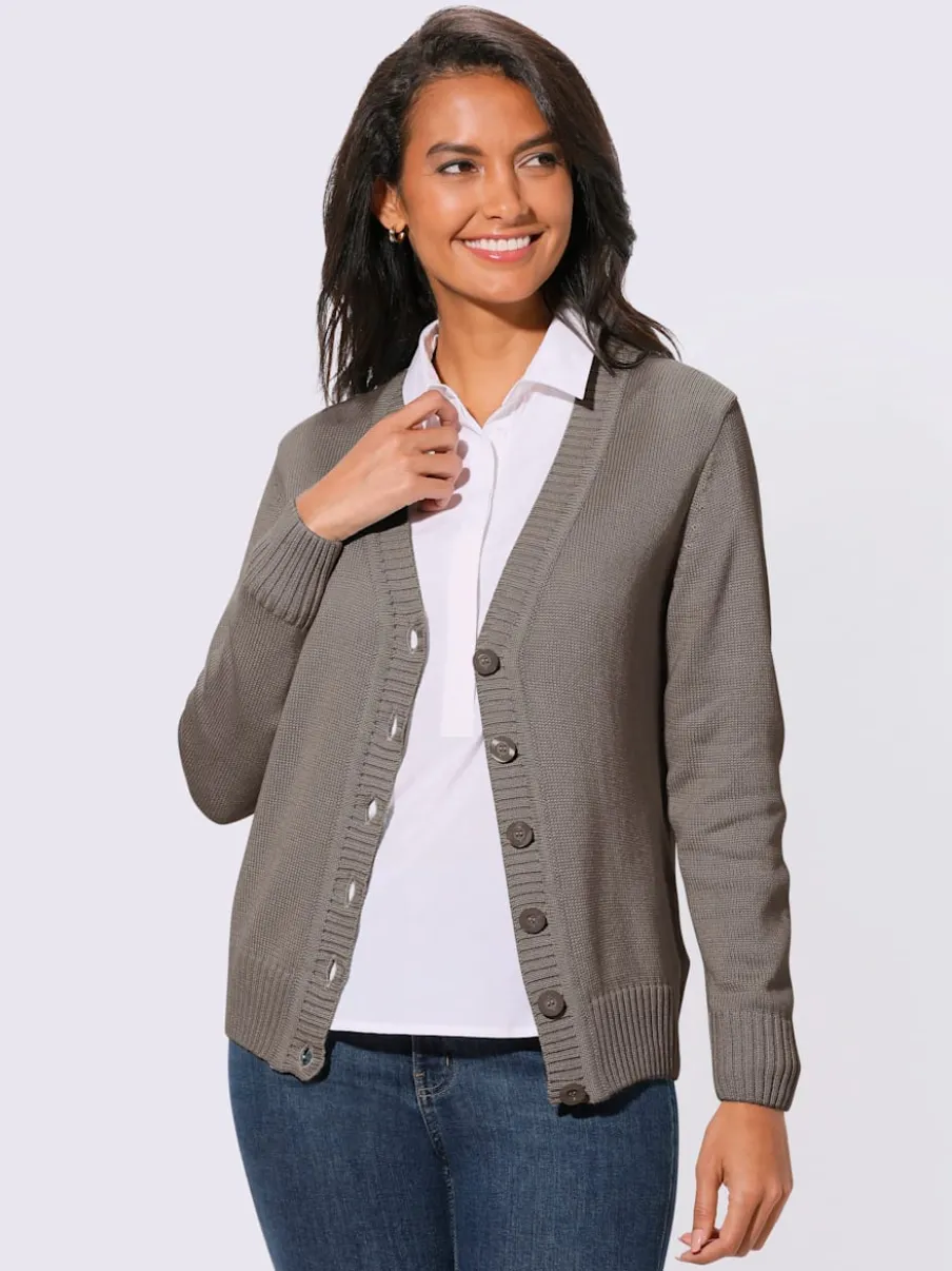 Veste en tricot avec boutons et manches longues confortables