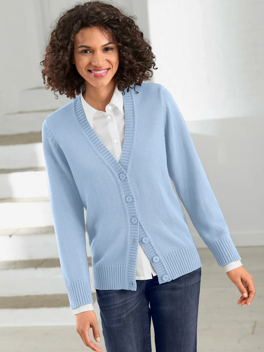 Veste en tricot avec boutons et manches longues confortables