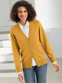 Veste en tricot avec boutons et manches longues confortables