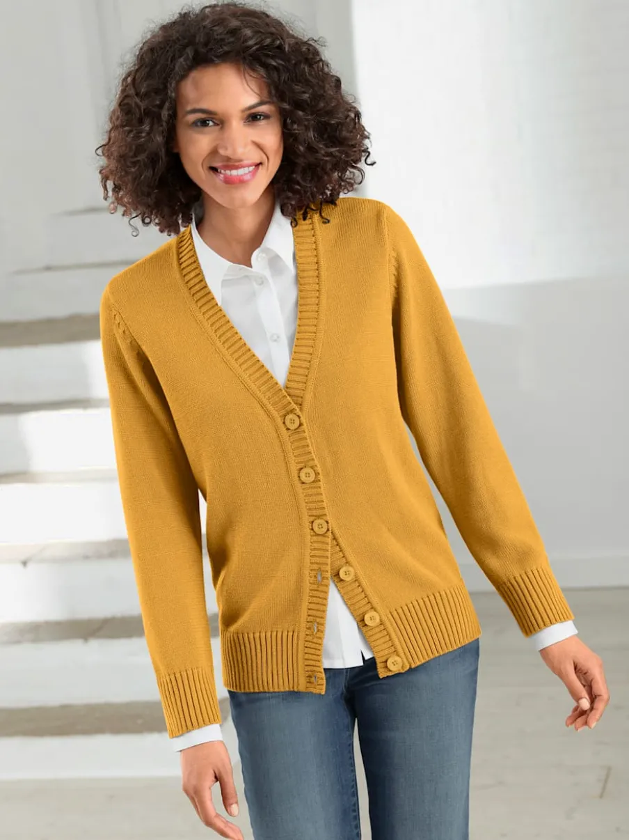 Veste en tricot avec boutons et manches longues confortables
