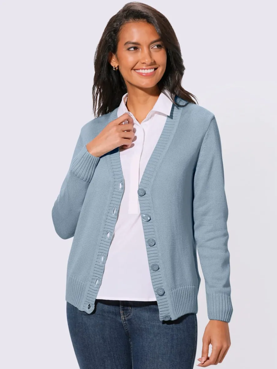Veste en tricot avec boutons et manches longues confortables
