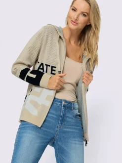 Veste en tricot avec capuche et motif ajouré