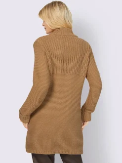 Veste en tricot avec col montant et poches fendues