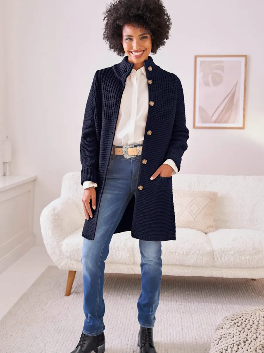 Veste en tricot avec col montant et poches fendues