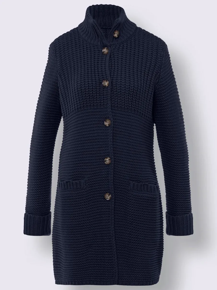 Veste en tricot avec col montant et poches fendues
