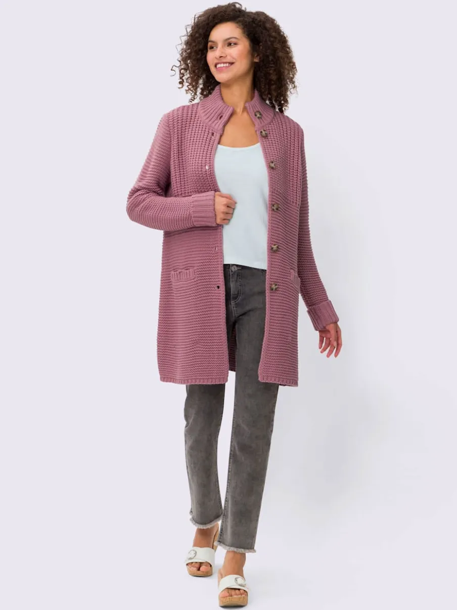 Veste en tricot avec col montant et poches fendues