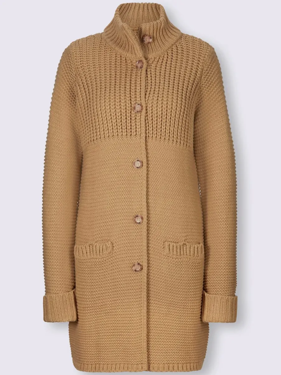 Veste en tricot avec col montant et poches fendues