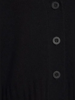 Veste en tricot avec encolure en V et bords-côtes larges