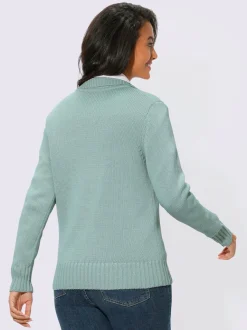 Veste en tricot avec glissière et finitions côtelées