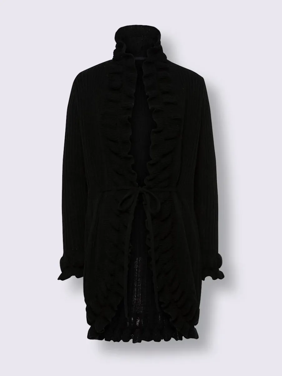 Veste en tricot avec volants et motifs variés