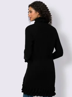 Veste en tricot avec volants et motifs variés