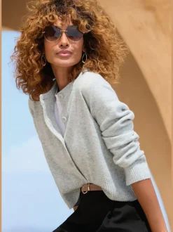 Veste en tricot à col rond avec patte de boutonnage et manches longues
