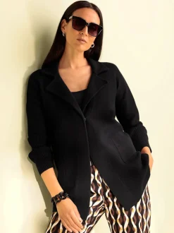 Veste en tricot douce avec col à revers et poches