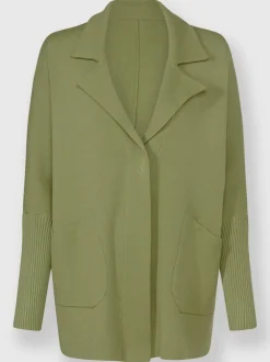 Veste en tricot douce avec col à revers et poches