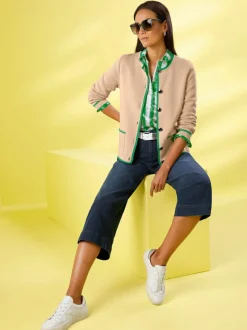 Veste en tricot douce avec col rond et poches