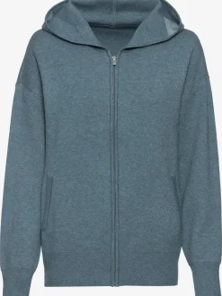 Veste en tricot douce à glissière et manches longues avec capuche