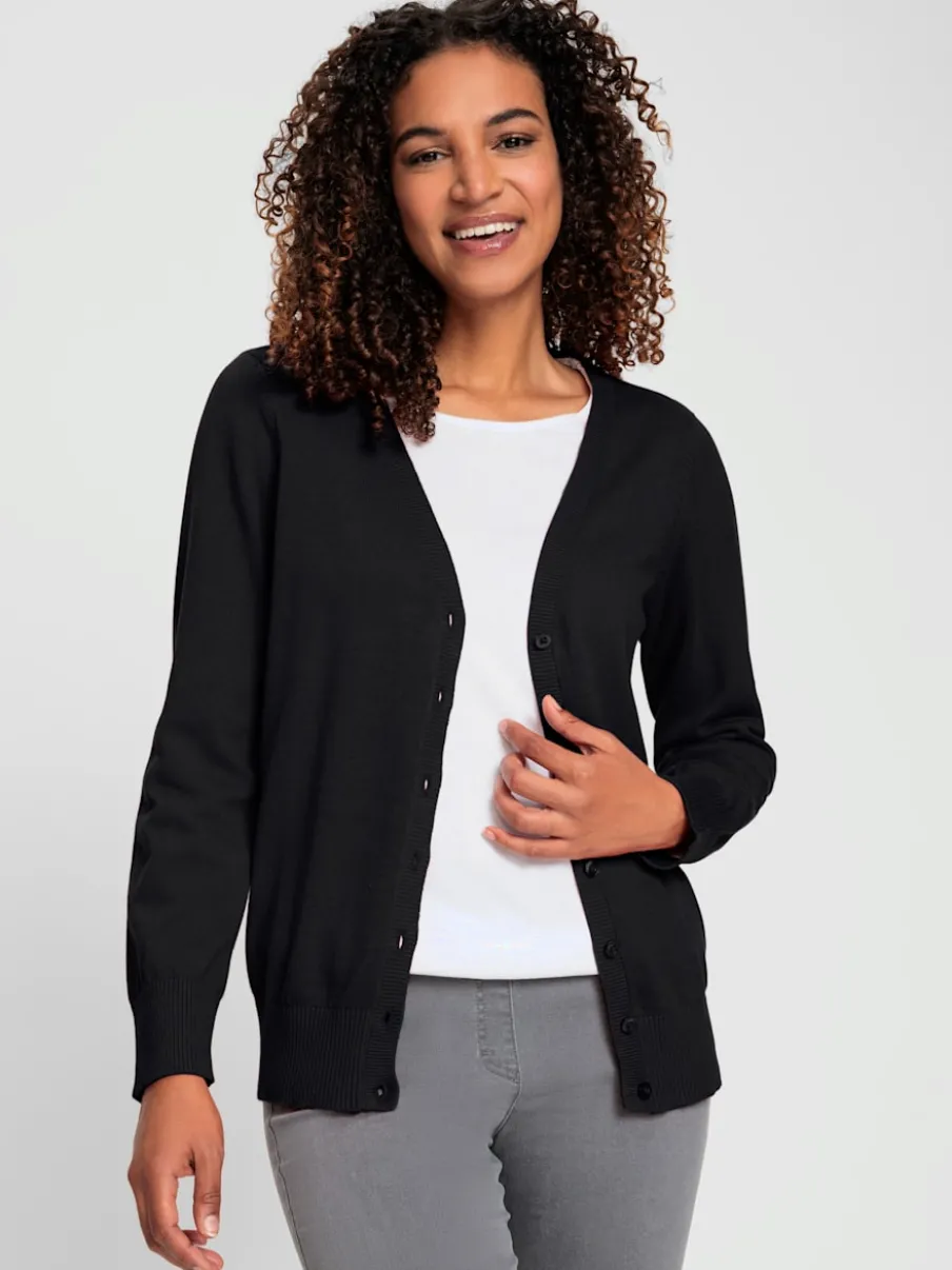 Veste en tricot doux avec col en V boutonné