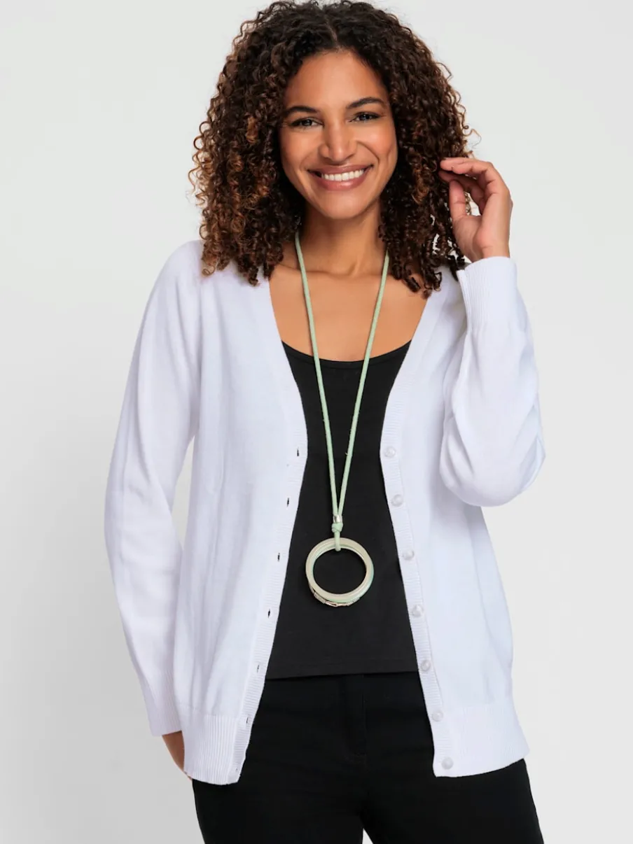 Veste en tricot doux avec col en V boutonné