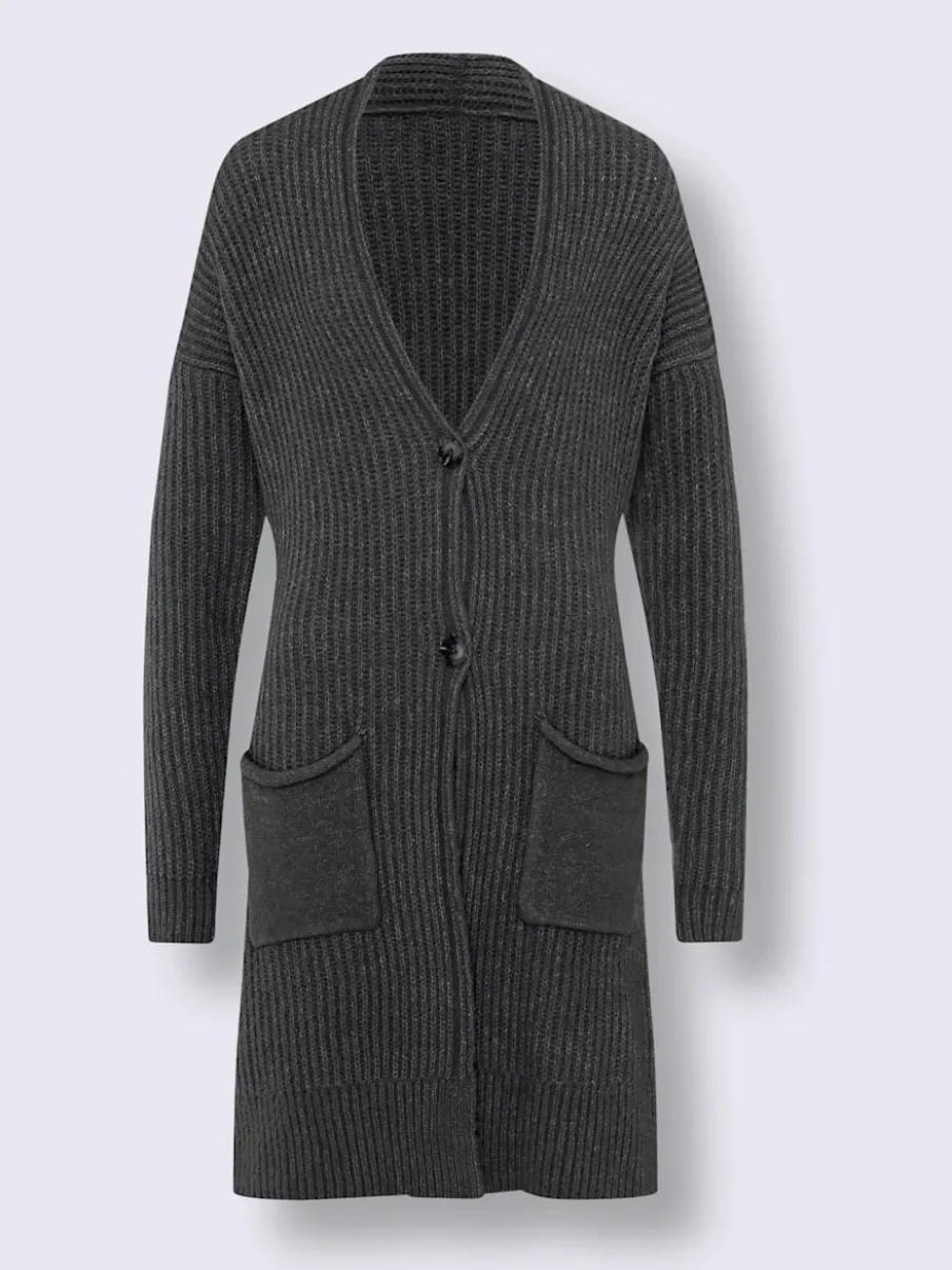 Veste en tricot doux à grosses mailles avec poches