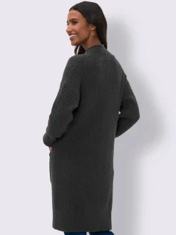 Veste en tricot doux à grosses mailles avec poches