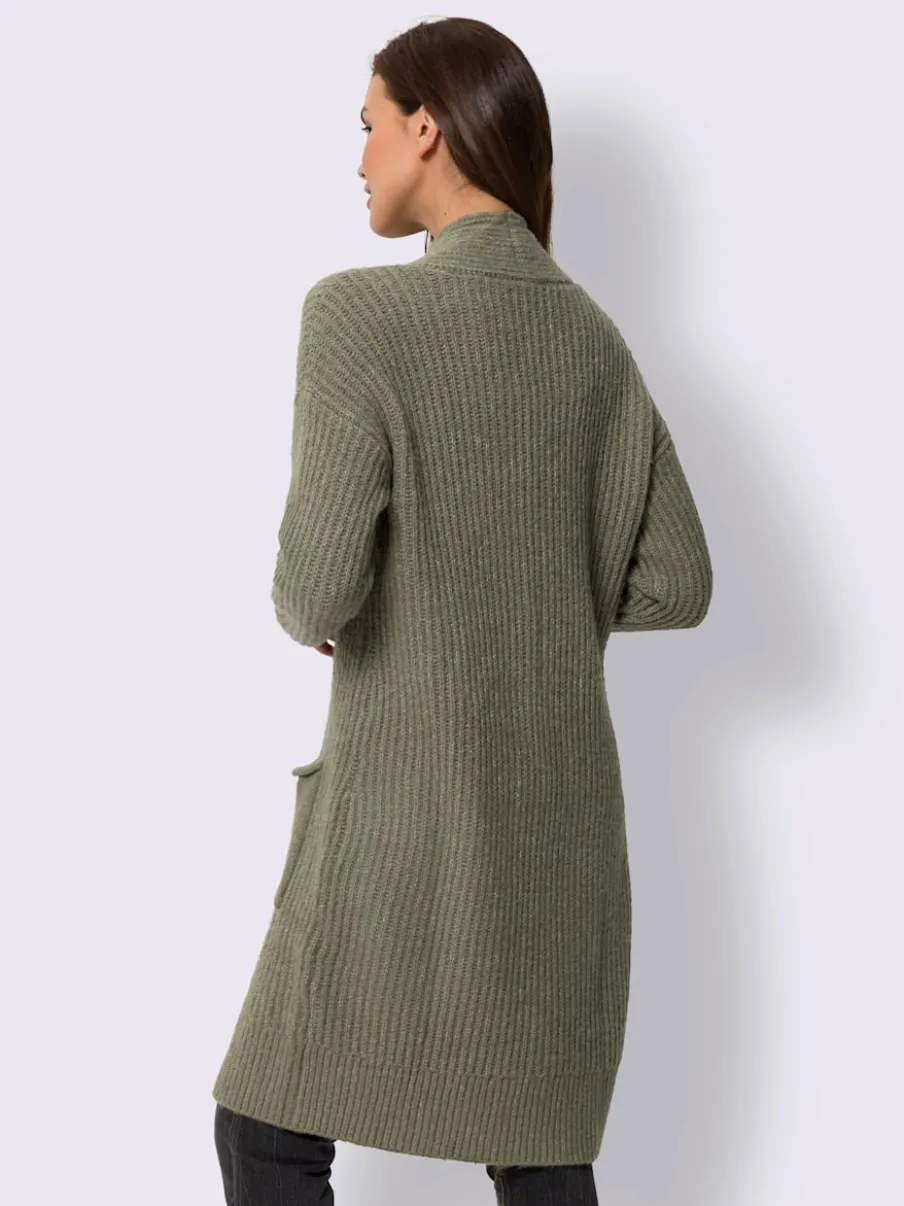 Veste en tricot doux à grosses mailles avec poches